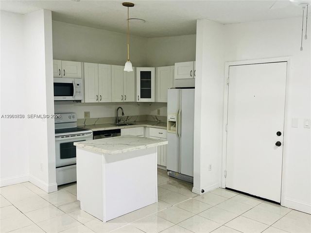 9743 W Mcnab Road 209, Tamarac, FL 33321
