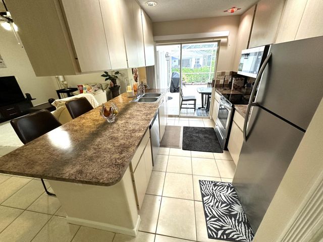 1702 Silverleaf Oak Court, Palm Beach Gardens, FL 33410