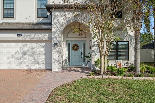 1216 MULTIFLORA LOOP, Lutz, FL 33558