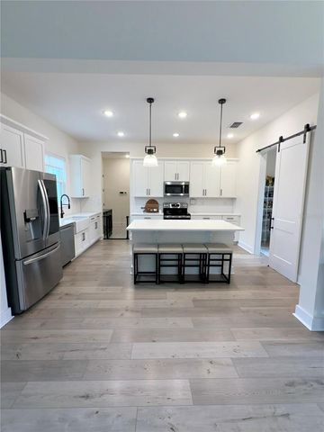 310 W WASHINGTON AVENUE, Lake Helen, FL 32744
