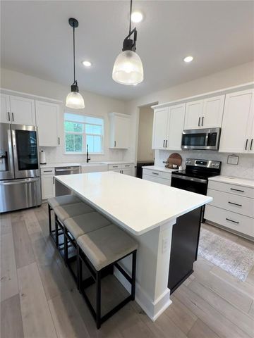 310 W WASHINGTON AVENUE, Lake Helen, FL 32744