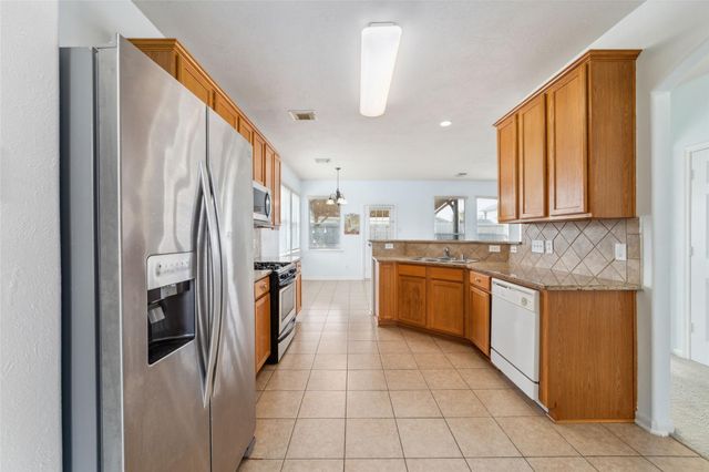 12307 Mint Teal Court, Houston, TX 77066