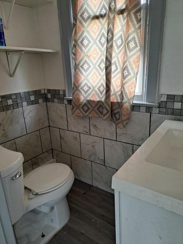 911 N 37th STREET, Milwaukee, WI 53208