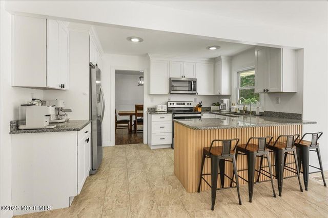 12 Maxwell Lane, Manalapan, NJ 07726