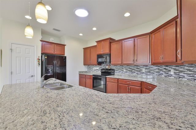 2423 RICHMOND GREENS COURT, Sun City Center, FL 33573