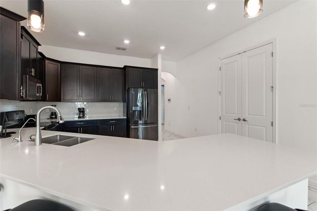 1424 OLYMPIC CLUB BLVD, Davenport, FL 33896