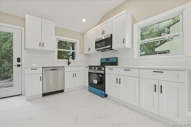 7 Surrey Road, Massapequa, NY 11758