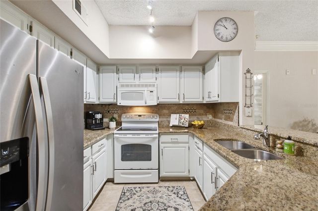 13037 MULBERRY PARK DRIVE 518, Orlando, FL 32821