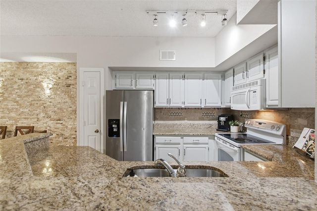 13037 MULBERRY PARK DRIVE 518, Orlando, FL 32821