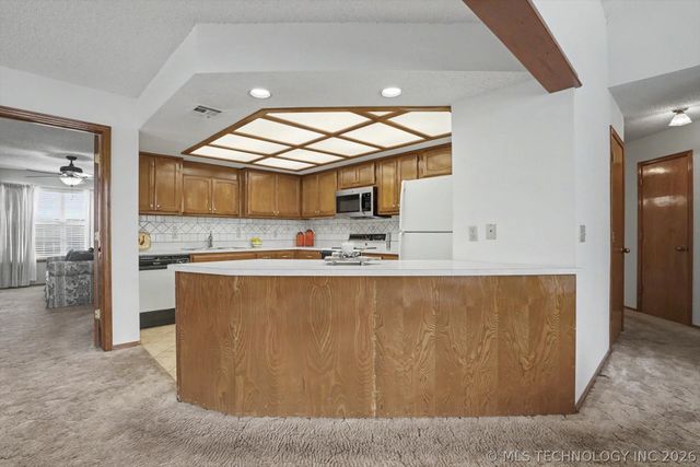 12502 E 77th Place North, Owasso, OK 74055