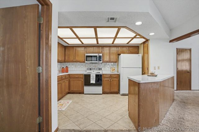 12502 E 77th Place North, Owasso, OK 74055