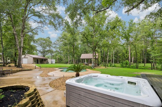 11409 Oak Springs Drive, Willis, TX 77378