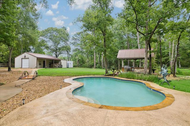 11409 Oak Springs Drive, Willis, TX 77378