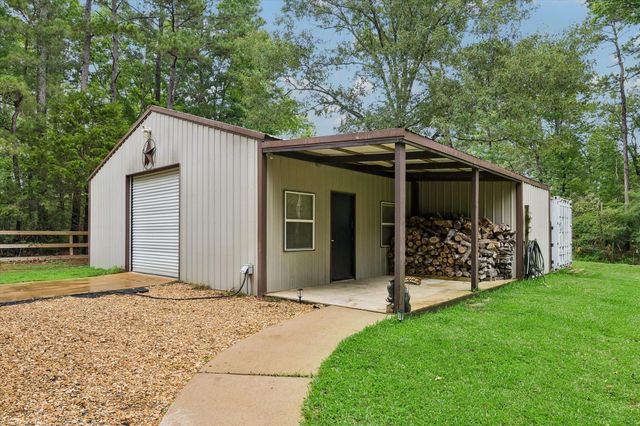11409 Oak Springs Drive, Willis, TX 77378