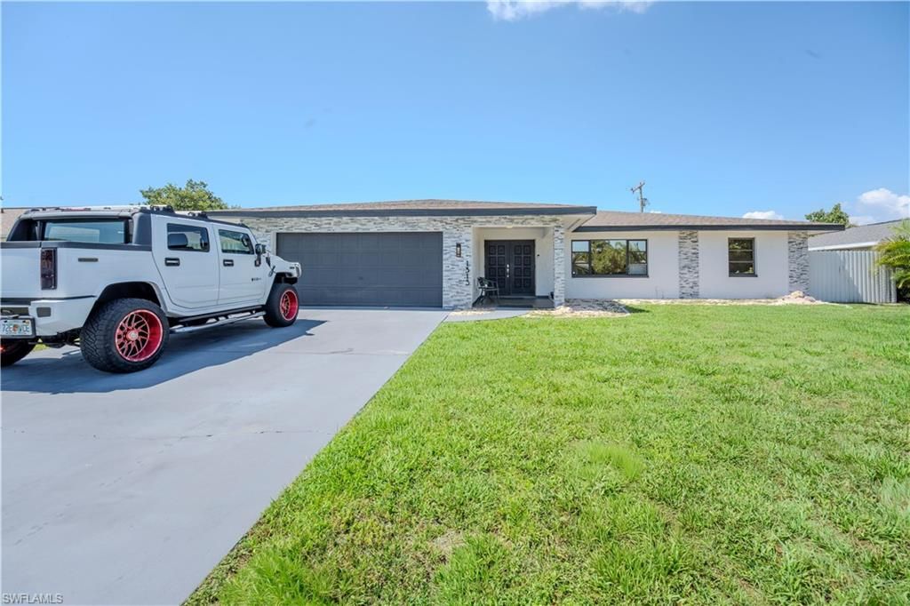 1313 SE 37th TER, CAPE CORAL, FL 33904 — exterior
