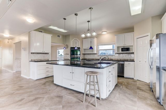 1303 Tiki Drive, Tiki Island, TX 77554