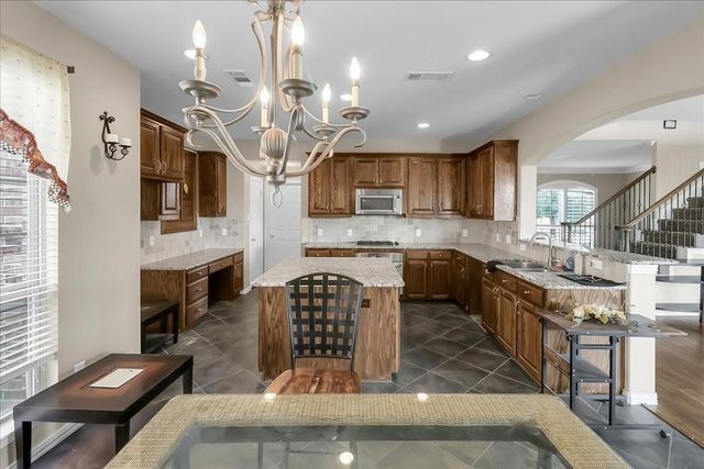 7306 Waterbury Drive, Rowlett, TX 75089