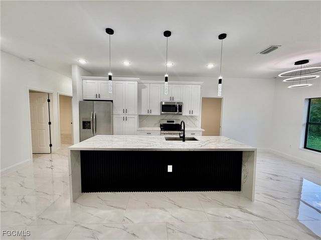 684 Kingsbury ST E, Lehigh Acres, FL 33974