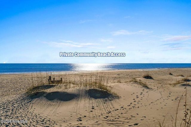 99 Oceangreens Lane, Oak Island, NC 28465