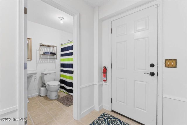 99 Oceangreens Lane, Oak Island, NC 28465