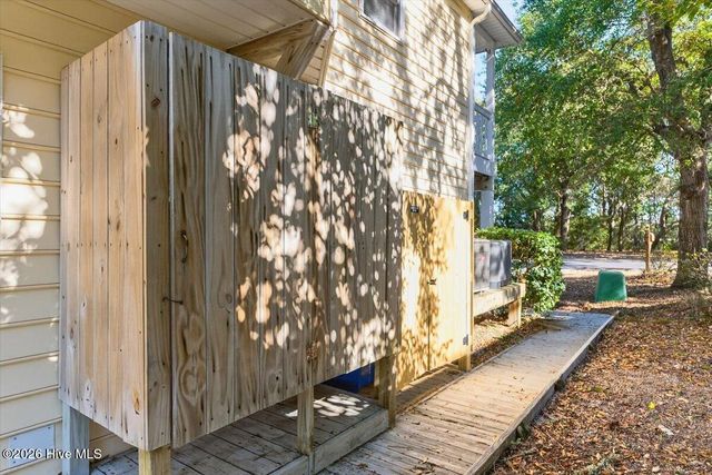 99 Oceangreens Lane, Oak Island, NC 28465