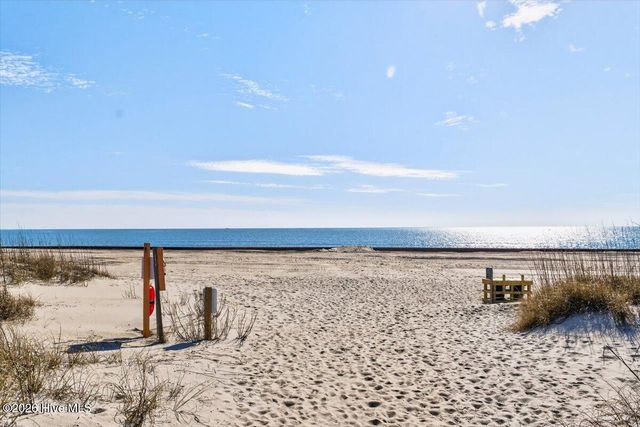 99 Oceangreens Lane, Oak Island, NC 28465