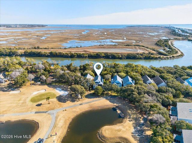 99 Oceangreens Lane, Oak Island, NC 28465