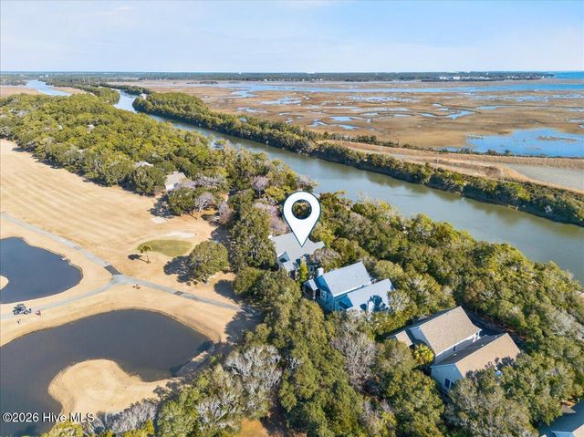 99 Oceangreens Lane, Oak Island, NC 28465