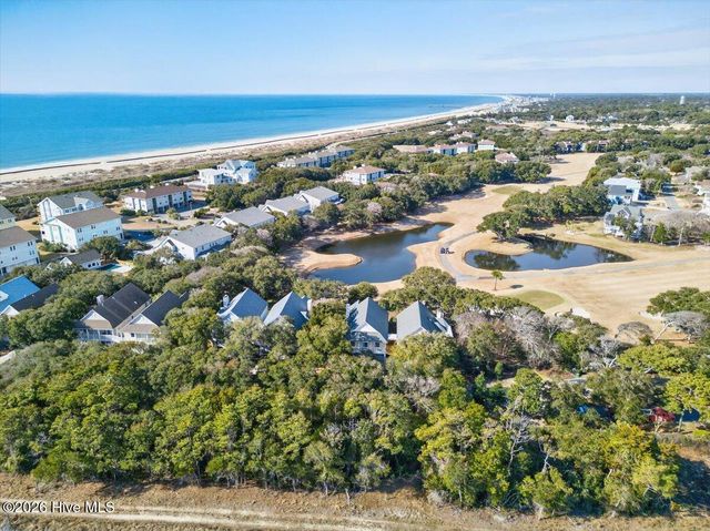 99 Oceangreens Lane, Oak Island, NC 28465