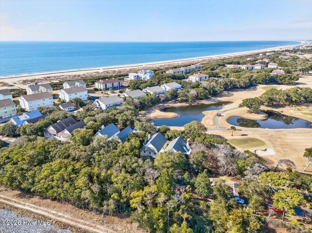 99 Oceangreens Lane, Oak Island, NC 28465