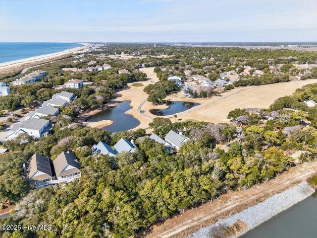 99 Oceangreens Lane, Oak Island, NC 28465