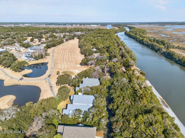 99 Oceangreens Lane, Oak Island, NC 28465