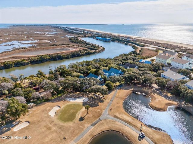 99 Oceangreens Lane, Oak Island, NC 28465