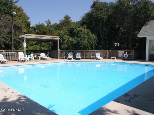 99 Oceangreens Lane, Oak Island, NC 28465