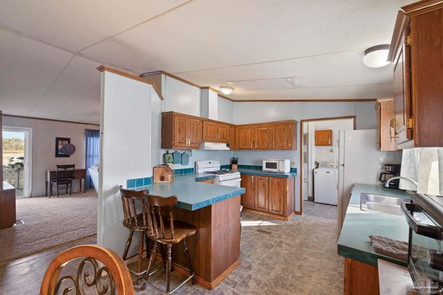5051 W Hwy 4, Walnut Hill, FL 32535