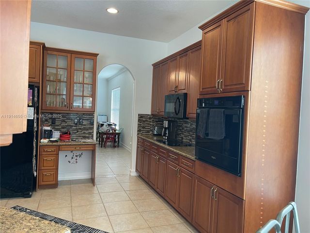 7009 NW 113th Ave, Parkland, FL 33076