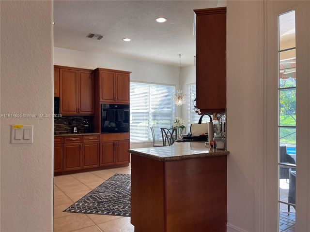 7009 NW 113th Ave, Parkland, FL 33076