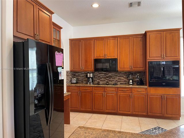 7009 NW 113th Ave, Parkland, FL 33076