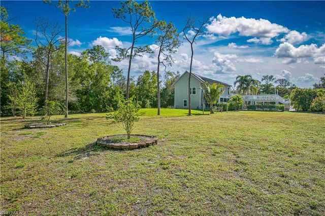 6941 Hunters RD, Naples, FL 34109