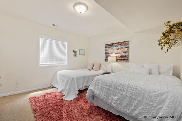 925 WHISPERING HILLS, Cheyenne, WY 82009