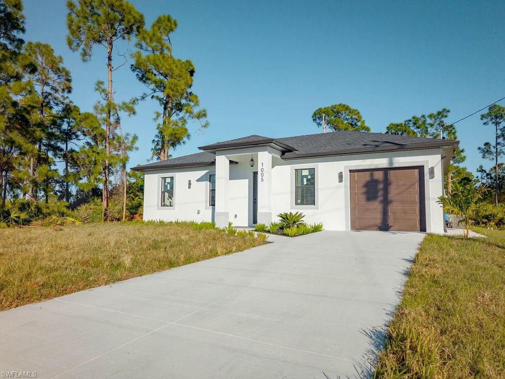 1005 Brenton AVE, LEHIGH ACRES, FL 33974 — exterior
