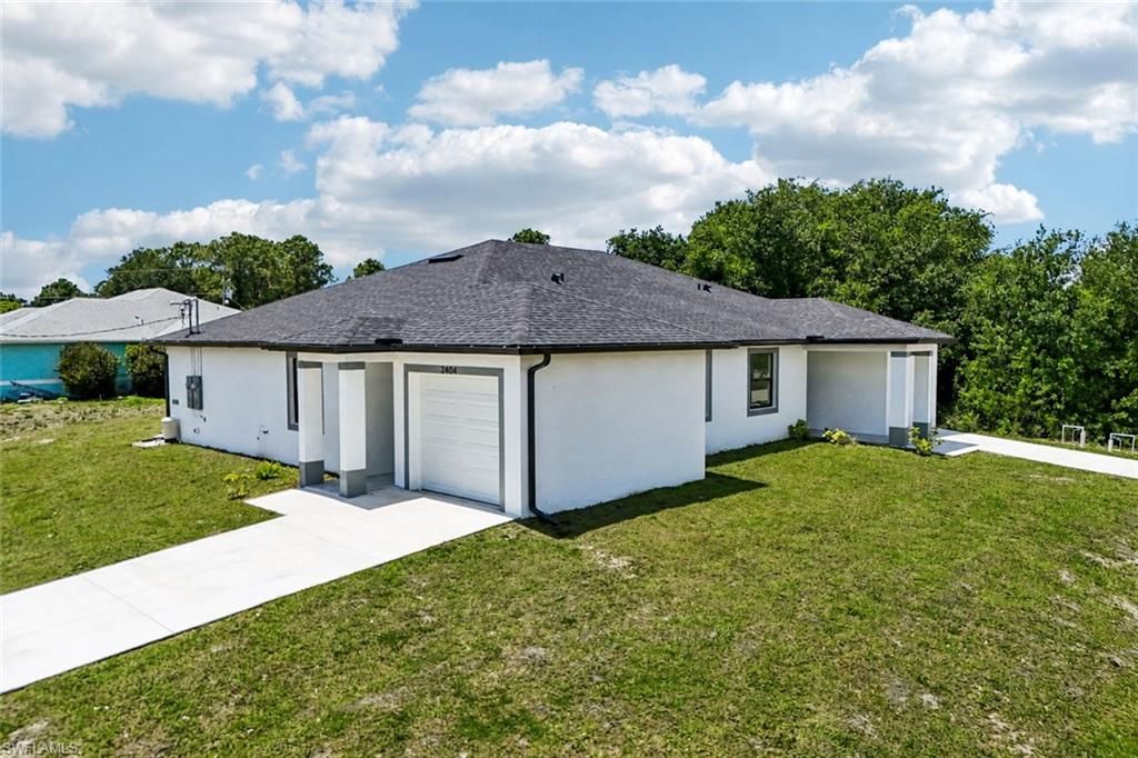 2404-2406 Hightower AVE S, LEHIGH ACRES, FL 33973 — exterior