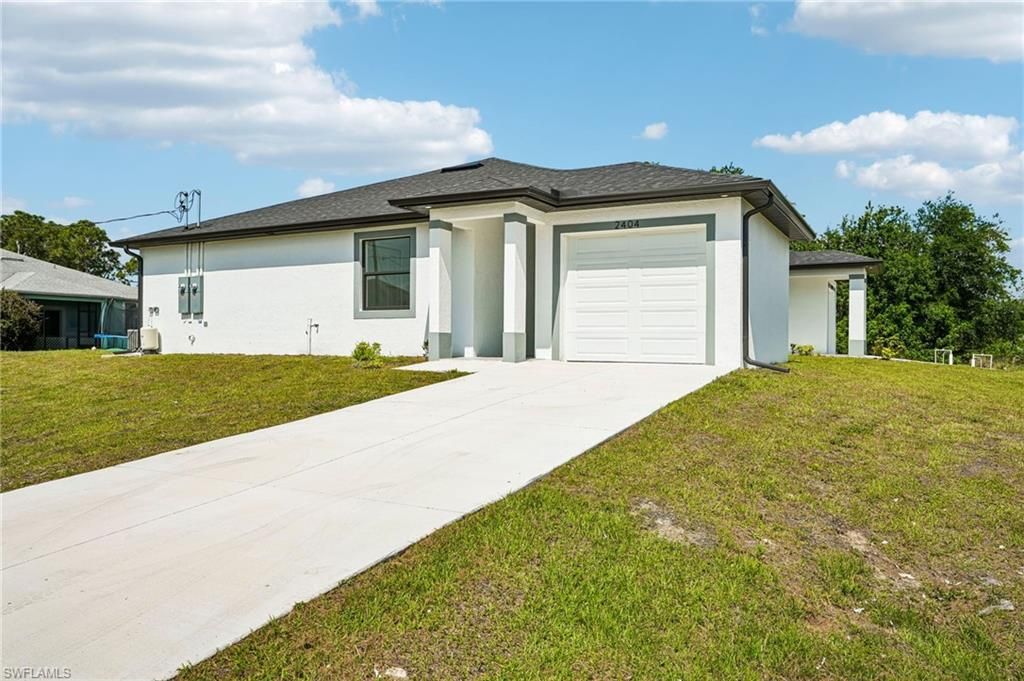 2404-2406 Hightower AVE S, LEHIGH ACRES, FL 33973 — photo 2
