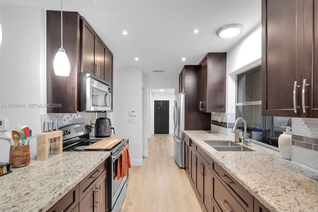 1180 NW 49th Ct, Deerfield Beach, FL 33064