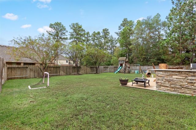 14104 N Crater Lake Court, Conroe, TX 77384