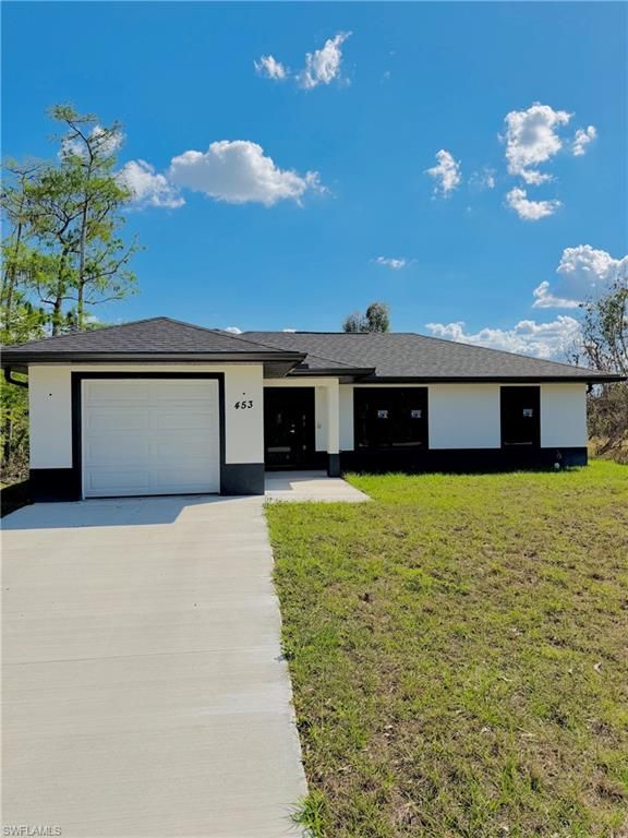 453 Greenbriar BLVD, Lehigh Acres, FL 33972