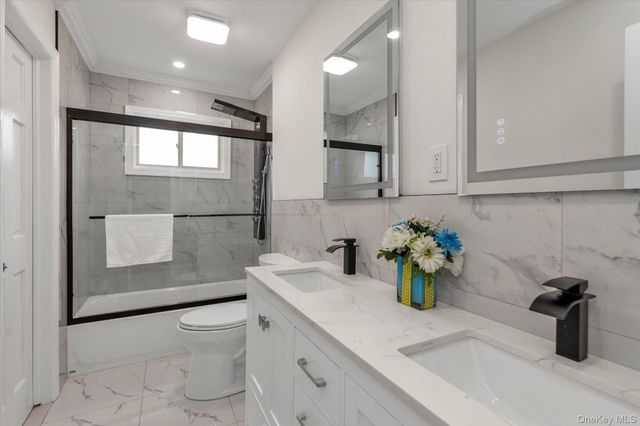 57 E Clinton Avenue, Roosevelt, NY 11575