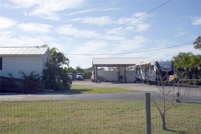 1007 77TH STREET E, Palmetto, FL 34221