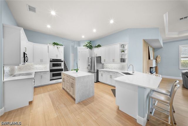 9069 The Lane, Naples, FL 34109