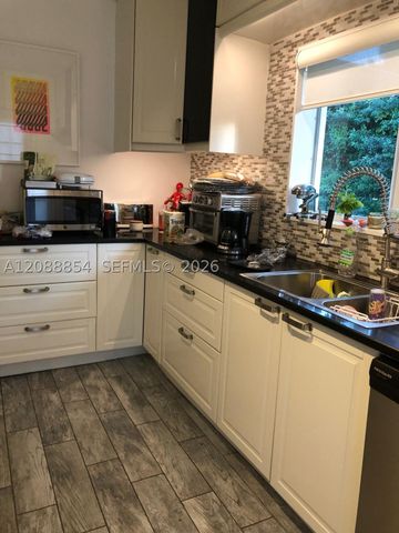 110 NW 87th St, El Portal, FL 33150